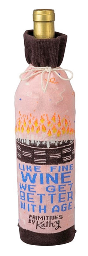 PRIMITIVES BY KATHY ALCOHOL WINE BOTTLE SOCK ‘LIKE FINE WINE WE GET BETTER WITH AGE’ - Novelty Socks for Less