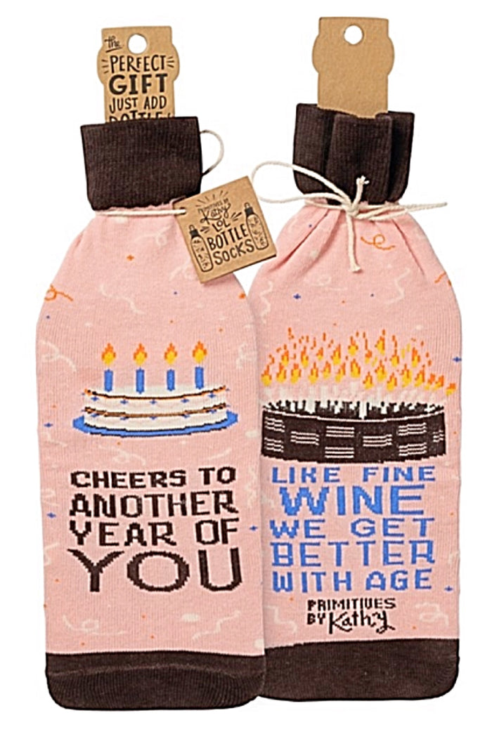 PRIMITIVES BY KATHY ALCOHOL WINE BOTTLE SOCK ‘LIKE FINE WINE WE GET BETTER WITH AGE’