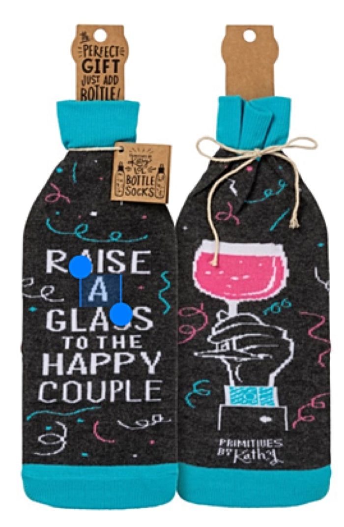 PRIMITIVES BY KATHY ALCOHOL WINE BOTTLE SOCK ‘RAISE A GLASS TO THE HAPPY COUPLE’